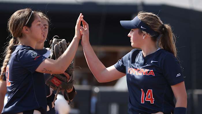 Eden Bigham high fives her teammates during the Virginia softball game against Hofstra at Palmer Park.